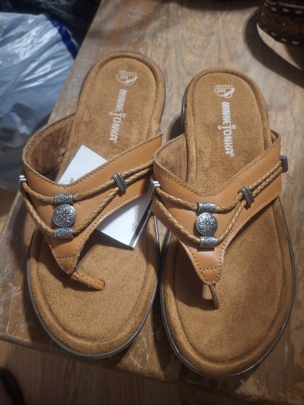 Minnetonka Tan Braided Thong Sandals with Silver Conchos